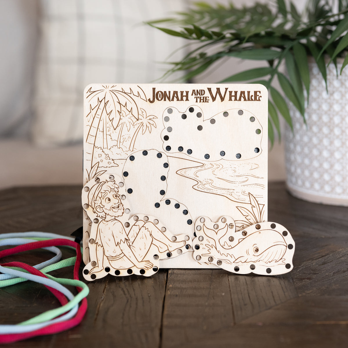 Jonah and the Whale wooden lacing board with removable Jonah and whale pieces