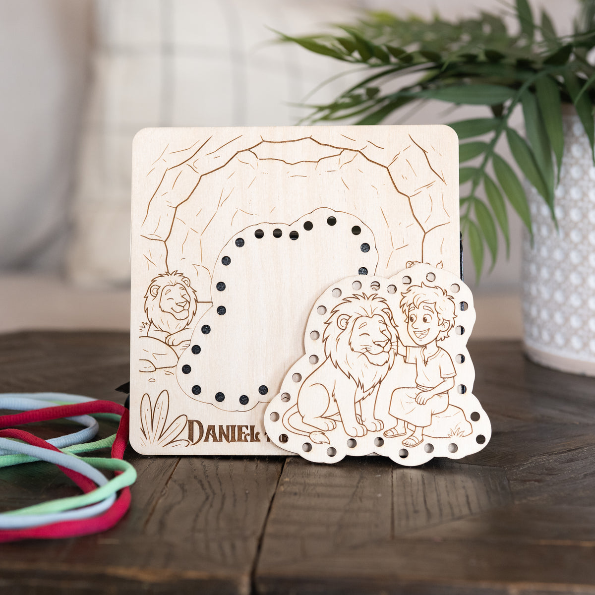 Daniel in the Lion's Den wooden lacing board with removable lion and Daniel piece